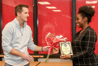  Daniel Krsteski, awards chair for the MASSW Region M — Macomb County, left, presents the award to Danielle Lewis. 