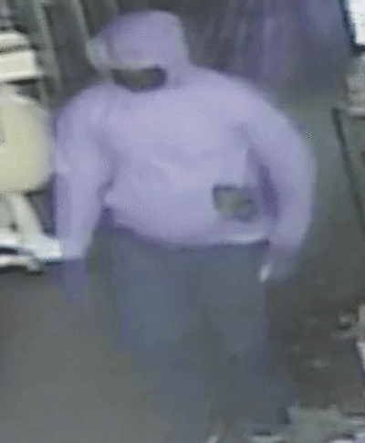  This surveillance image shows the suspect in a July 21 break-in at a Shelby Township party store in the area of Van Dyke Avenue and 21 Mile Road. 