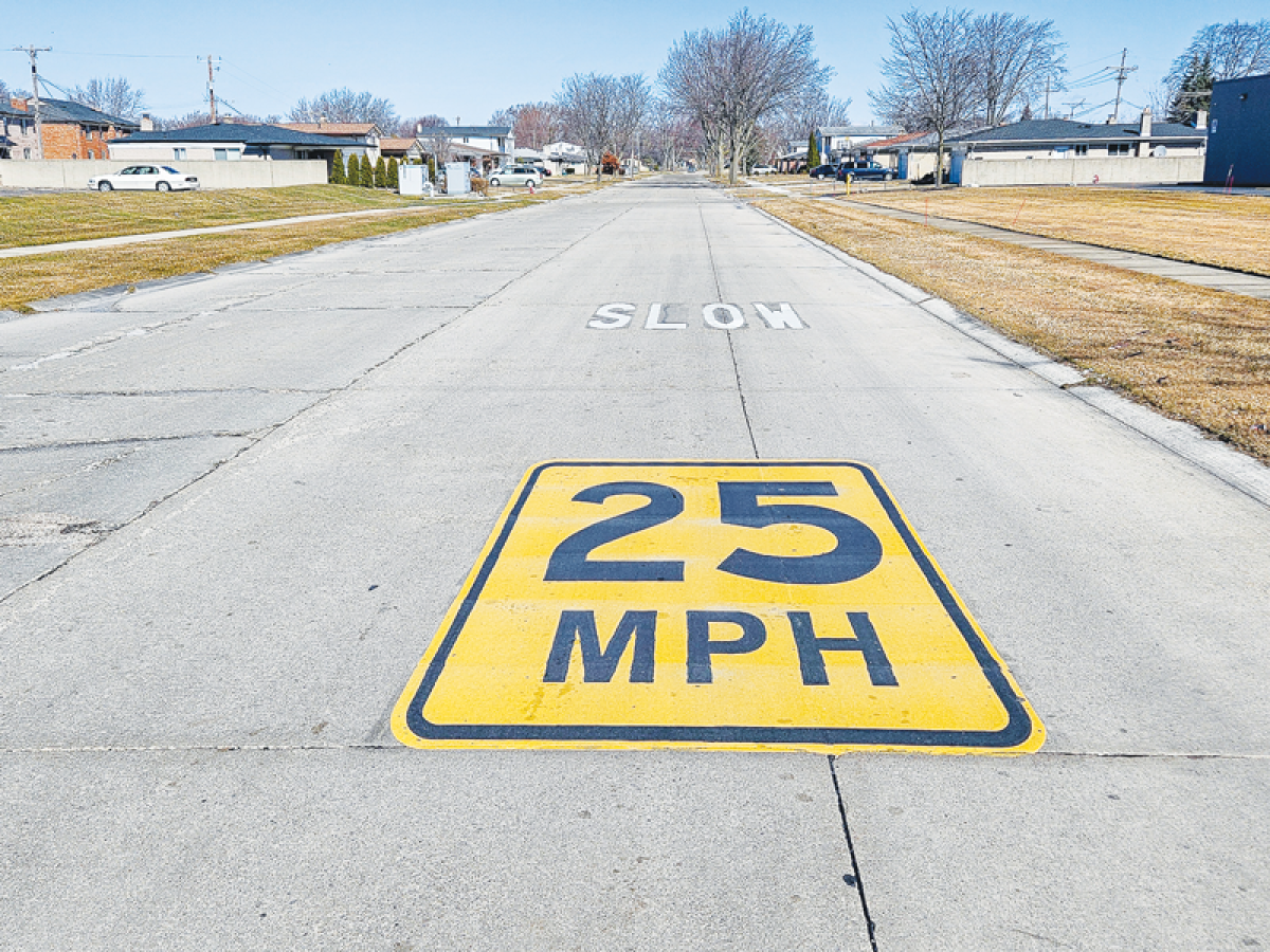  Viceroy Drive, near the 14 Mile Road entrance in Sterling Heights, has pavement markings telling motorists to slow down to the speed limit. Sterling Heights officials hope that a Comprehensive Transportation Safety Action Plan study will clarify the strategies needed to calm traffic and keep people safe. 