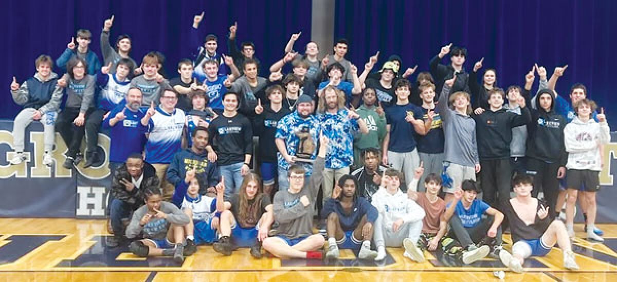 St. Clair Shores Lakeview celebrates a team district championship win on Feb. 7 at Grosse Pointe South High School. 