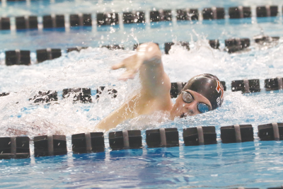  Utica Ford II senior Owen Baker races in the 100 freestyle at the LCN Invitational Feb. 27 at L’Anse Creuse North High School. 