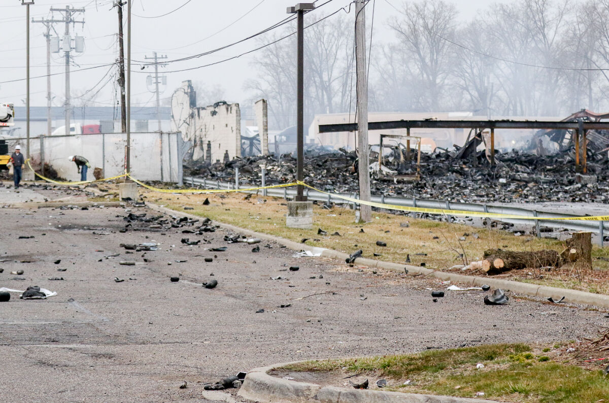  Debris litters the area near 15 Mile Road and Groesbeck Highway in Clinton Township on March 5, the morning after an explosive fire at Select Distributors.   