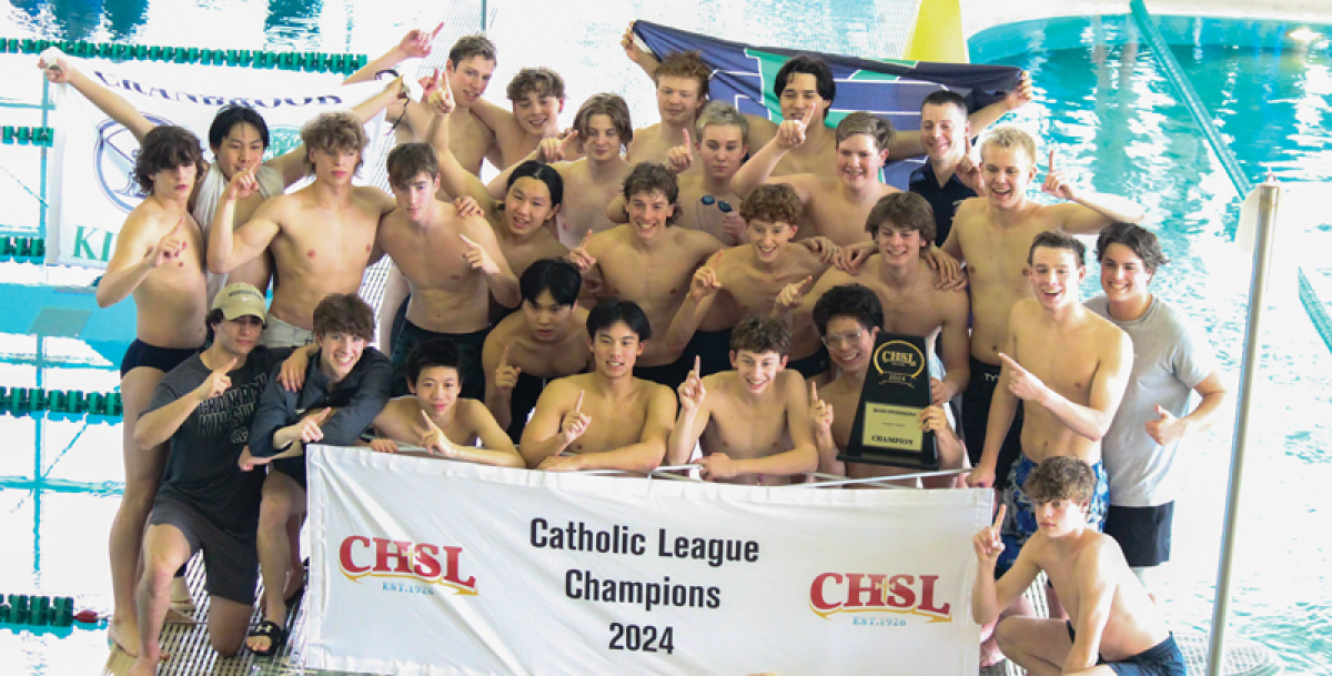  Bloomfield Hills Cranbrook Kingswood celebrates its first place finish at the Catholic League Championships March 2 at Waterford Kettering High School. 