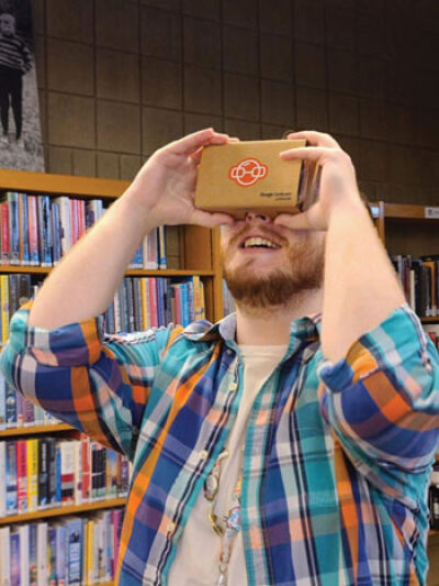  VR headsets, like the one used by Fraser Public Library’s Head of Circulation Alex Williams, pictured, will allow Fraser Public Library patrons to see what it’s like to dive to the bottom of the ocean, explore lost shipwrecks and traverse enormous reefs. 