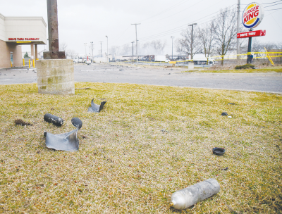  The debris field included whole metal canisters and chunks of shrapnel from those that exploded. Investigators said 19-year-old Turner Salter, of Clinton Township, died after he was hit by debris. 