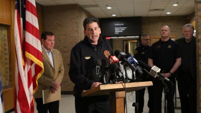  Fire Marshal Chuck Champagne of the Clinton Township Fire Department speaks to the press on March 8 at the Clinton Township Civic Center about the process and challenges facing investigators of the fire at Select Distributors.  