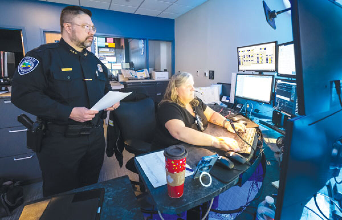  West Bloomfield Police Department Deputy Chief Dale Young, left, is pictured with Jennifer Schuler, who works as a dispatch leader at the department. Young was recently promoted to the position of deputy chief. 
