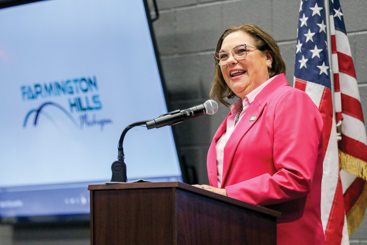  Farmington Hills Mayor Theresa Rich addresses attendees at a State of the Cities Greater Farmington Area Chamber of Commerce event earlier this month. Development and infrastructure were a couple of the subjects Rich touched on during her address. 