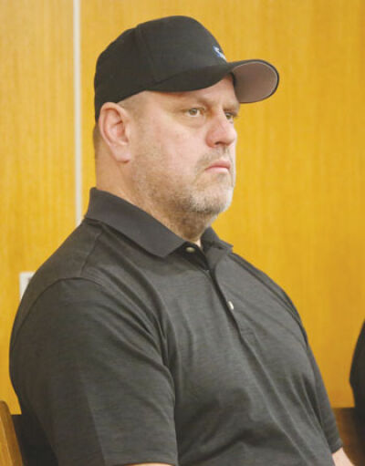  Dan Kress, a newly elected Clinton Township trustee, watches the March 4 Board of Trustees meeting at the Clinton Township Civic Center. Kress was elected on Feb. 27, but county officials had not finished certifying the election. 