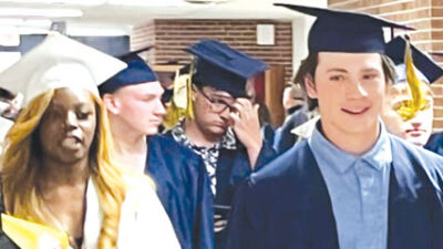  Fraser families clash over cap and gown colors 