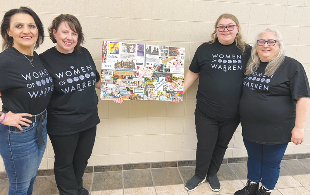  Women of Warren show off their new vision for the city with a vision board: from left, Rebecca Zainos, Monica Papasian, Alex Kelley and Rochelle Kelley. Diversity and inclusion, economic prosperity, education, community, and revitalization of the downtown are some of the things the Women of Warren are envisioning for the city.   