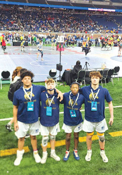  Fraser senior Bryce Warner, left; sophomore Ethan Miller; junior Stanley Anderson; and junior Draven McAllister all qualified for the Michigan High School Athletic Association Division 1 state finals on March 1 at Ford Field. 