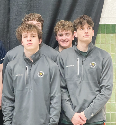  Grosse Pointe North’s 200-yard freestyle relay team — pictured from left, Connor McMahon (back), Keegan Wettstein (front), James Gusmano (back), and Thomas Moreland (front) — at the Michigan High School Athletic Association Division 2 State Championship on March 9 at Eastern Michigan University took seventh place, earned all-state, and set a school record with a 1:28.46 time. 