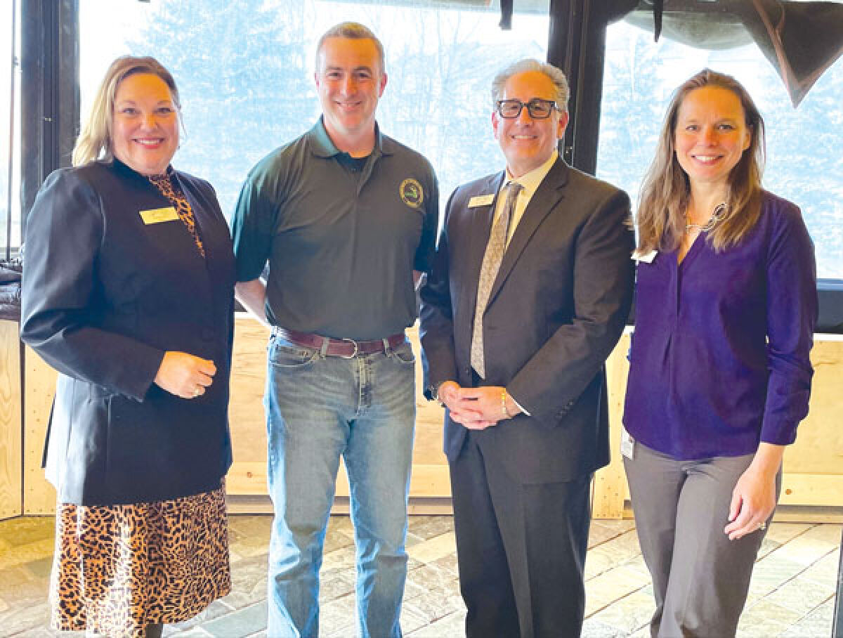  From the left, Farmington Hills Mayor Theresa Rich; Chad Stewart, who is a deer, elk and moose management specialist for the Michigan Department of Natural Resources; Farmington Hills City Manager Gary Mekjian; and Farmington Hills Assistant City Manager Karen Mondora attended the event. 