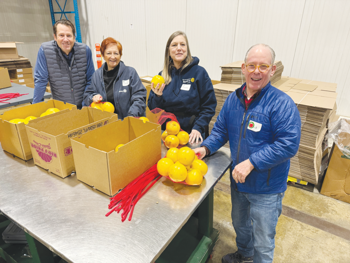  The Rotary Club of Birmingham volunteers at a food bank. 