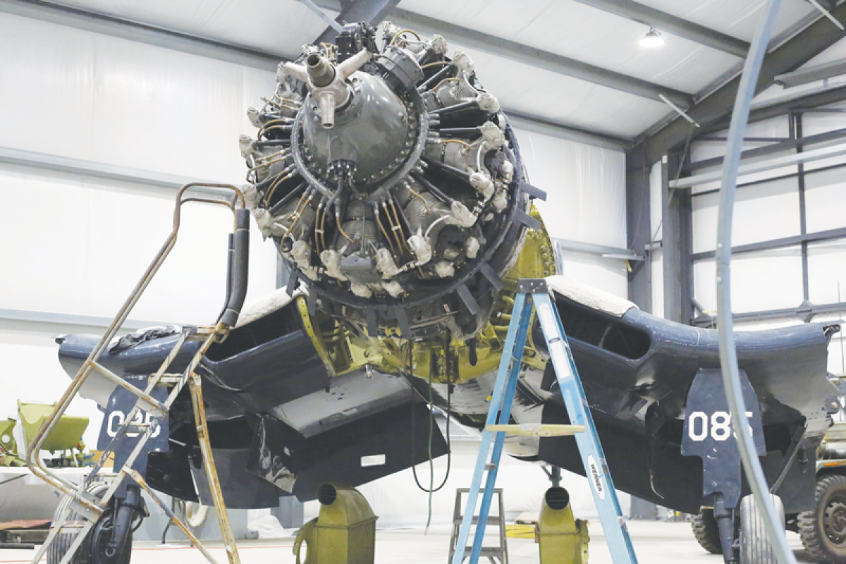  The Vought F4U Corsair was used by the Marines in the 1940s and 1950s.  Its large propeller required the fuselage  to be lifted above the wings.  