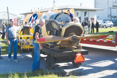  The Curtiss JN-4 Jenny as it arrived at Selfridge on Aug. 11, 2023. Volunteers unloaded the broken plane as it arrived by truck, just as the base’s first JN-4s arrived in 1917. 