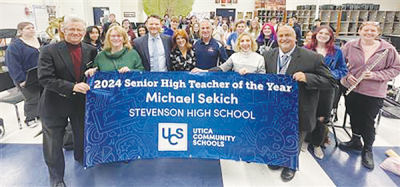  Utica Community Schools celebrated its three Teachers of the Year for their service and commitment April 2, including Michael Sekich, the Stevenson High School band teacher, who was also named the Macomb County High School Teacher of the Year. 