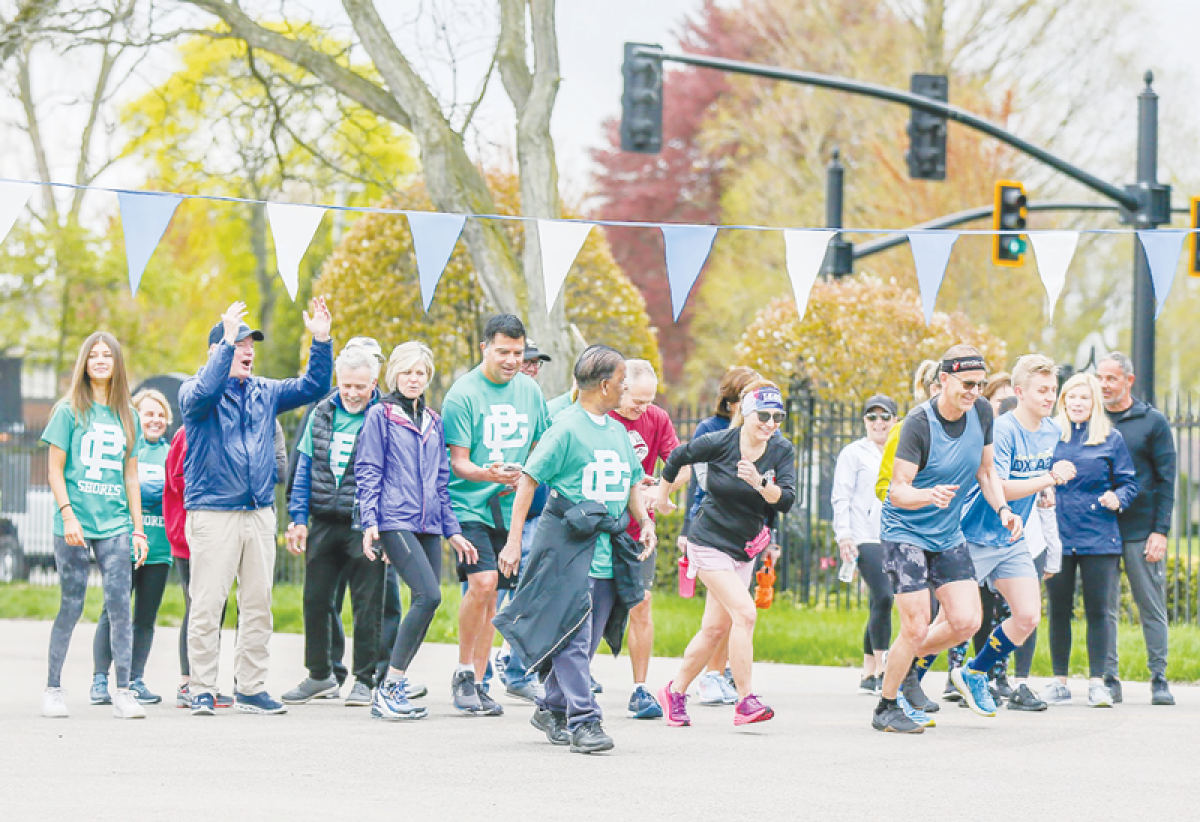  Runners and walkers await the signal to start during last year’s Arbor Day Fun Run in Grosse Pointe Shores. This year’s event will take place May 5. 