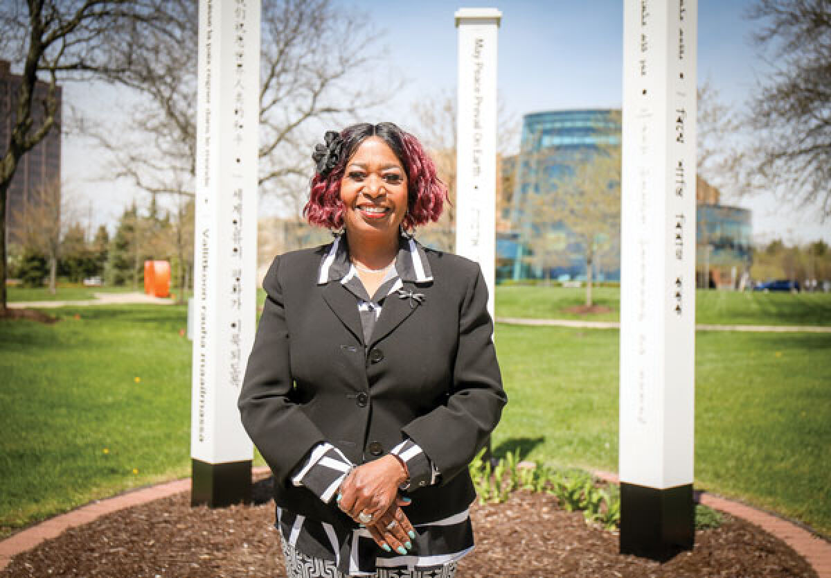  “I’m a peacemaker, just ask anyone,” said Rosemerry Allen as she posed with the peace poles near Southfield City Hall. 