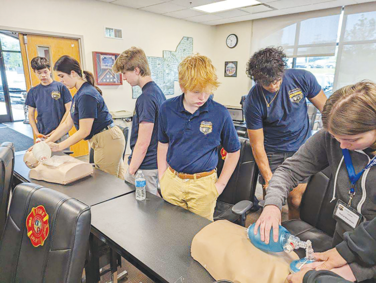 Regional Youth Police Academy cadets practice CPR during a past academy training session. 