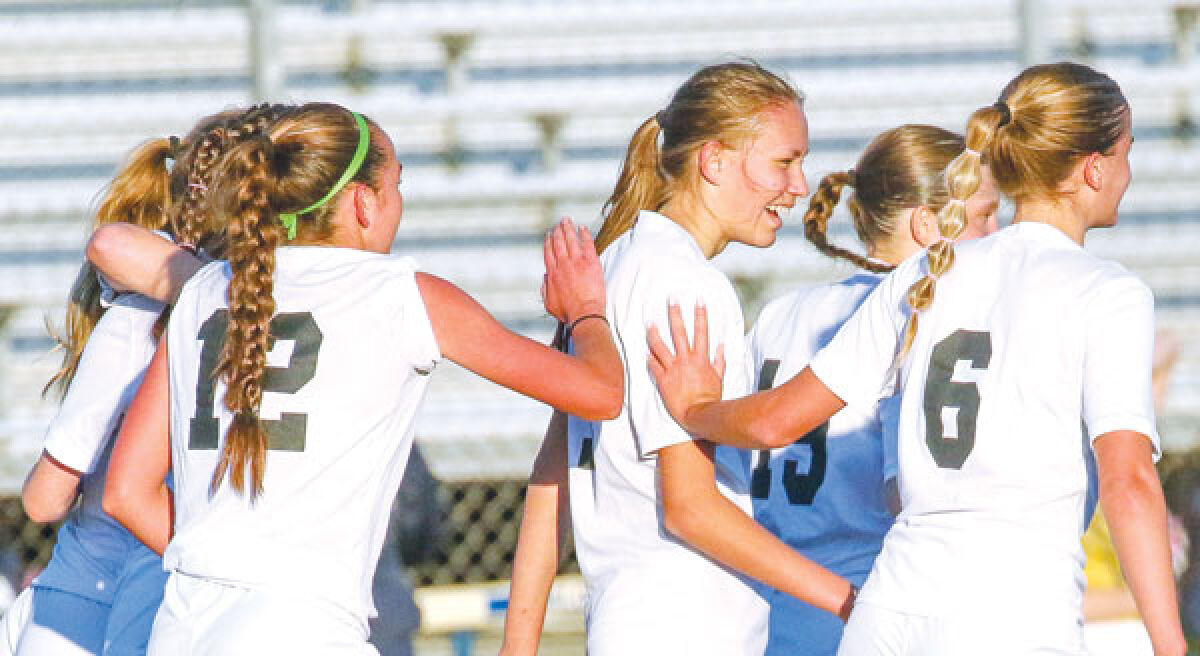  Troy celebrates a goal during their 4-1 win over Oxford April 30 at Oxford High School. 