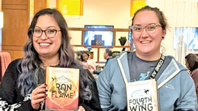  Troy introverts share love of reading through Silent Book Club 