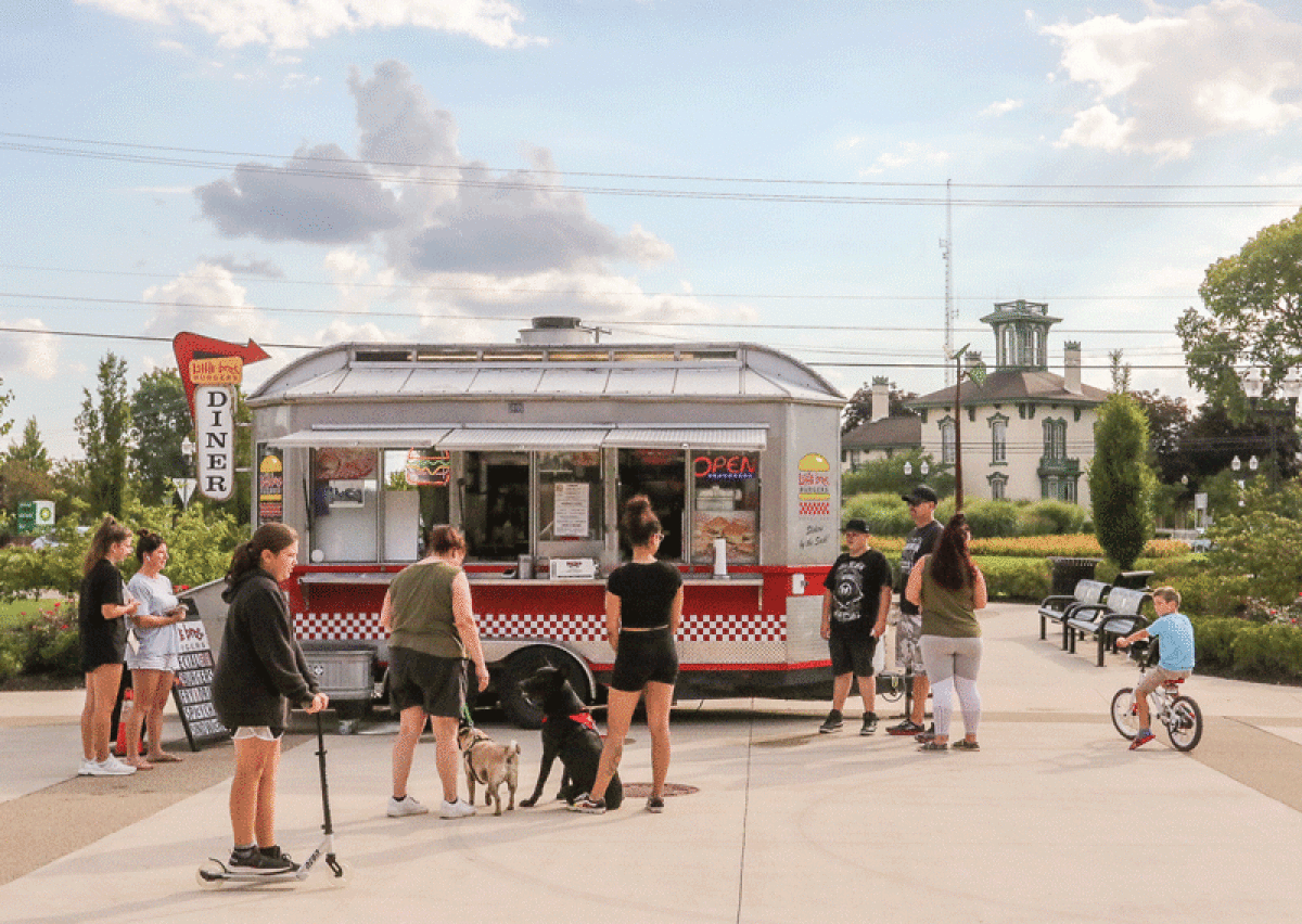  Little Bros. Burgers serves Dodge Park attendees during an Aug. 16 Takeout Tuesday event at Dodge Park. The food truck plans to attend the upcoming Sept. 9 Dodge Park Food Truck Rally. 