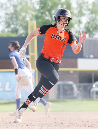 Utica senior Katelynn Perry runs to first base after a hit.