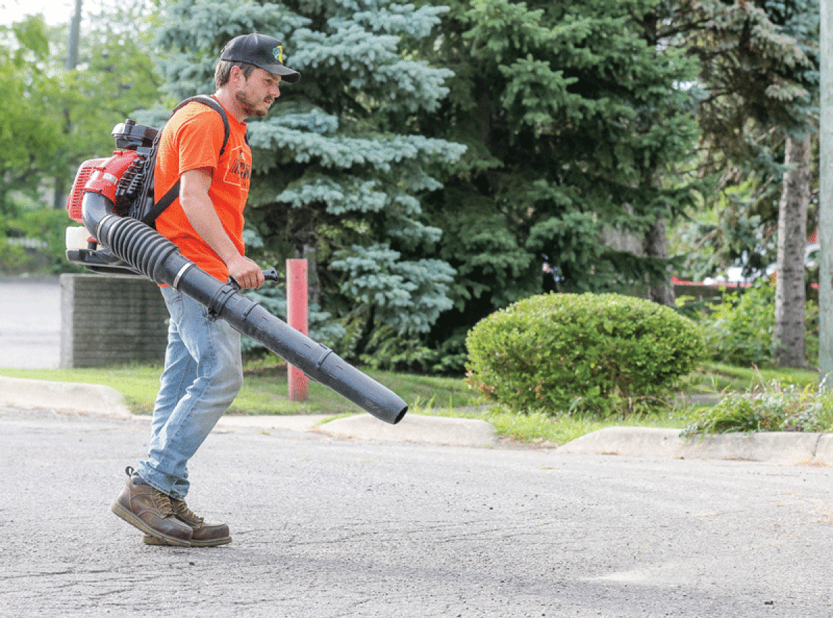  Jack Johnson, from Billings Lawn Equipment in Clawson, demonstrates a RedMax backpack leaf blower Aug. 17. A variety of lawn care equipment, including leaf blowers and vacuums, is available on the market to anyone who needs to clear a yard of autumn leaves. 