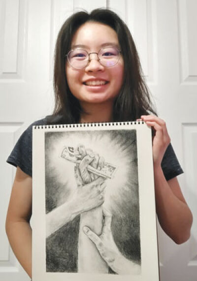  Novi High School graduate Lisa Chai shows her artwork that won third place in the 2022 Oakland County Treasurer’s Financial Literacy art contest. Chai plans to major in experience architecture at Michigan State University in the fall. 