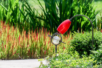  The front garden of Mark Sarver and Nasir Khawaja boasts pops of red. 