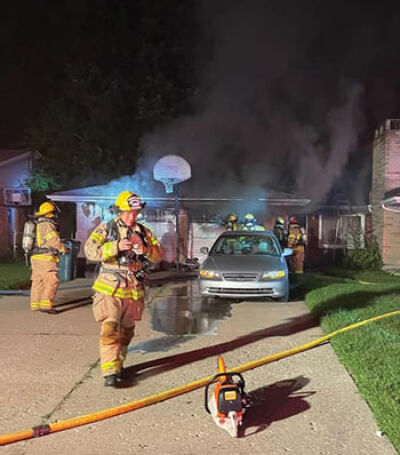  The Clawson Fire Department responds to an early-morning structure fire at a home in the 300 block of South Batchewana Avenue, near Crooks and 14 Mile roads, Aug. 13. 