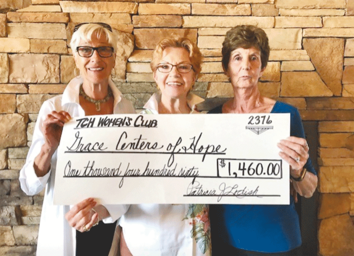  At their annual Founders’ Tea, the Birmingham Metropolitan Women’s Club raised money for Grace Centers for Hope through an auction.  
