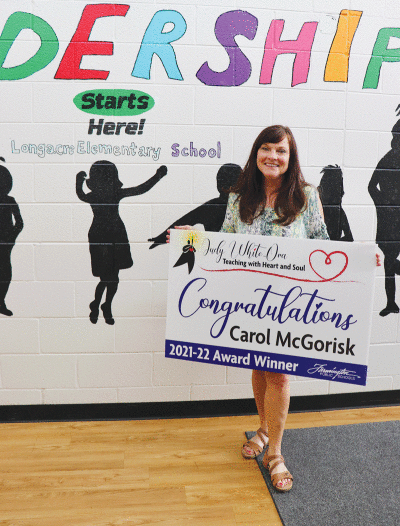  Carol McGorisk, a kindergarten teacher at Longview Elementary School, was presented with the Judy White-Ora Teaching with Heart and Soul Award during the Farmington Public Schools Board of Education meeting June 7.  