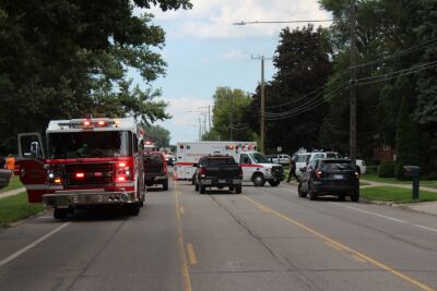  Emergency vehicles gather at the scene on Masonic Boulevard, west of Gratiot Avenue. 