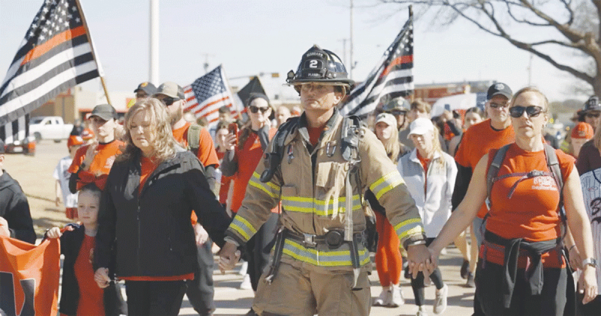  Firefighters and supporters take part in a Neighbors United #WalkForTheRed140 event in Texas in March 2022. The Michigan event will begin on Sept. 8 at Macomb Township Fire Department Station 2.  