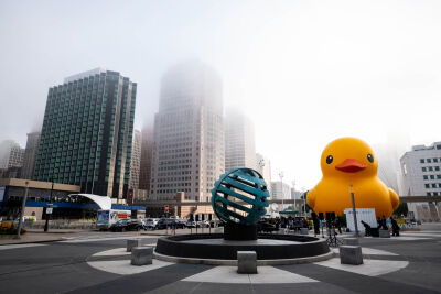  The "world's largest rubber duck" sits outside Huntington Place on the first morning of the North American International Auto Show Wednesday, Sept. 14, in Detroit. 