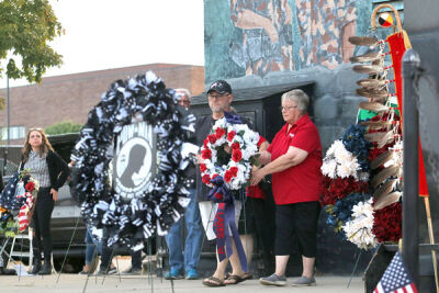  Members of various organizations, along with Oakland Hills Memorial Gardens, present wreaths to honor prisoners of war and those missing in action during the 43rd annual National POW/MIA Recognition Day service at Oakland Hills Memorial Gardens Sept. 16. 