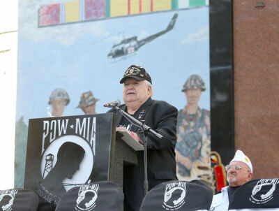  Joe Mishler, president of Vietnam Veterans of America Chapter 175 and Holly Area Veterans Resource Center, gives his keynote address. 