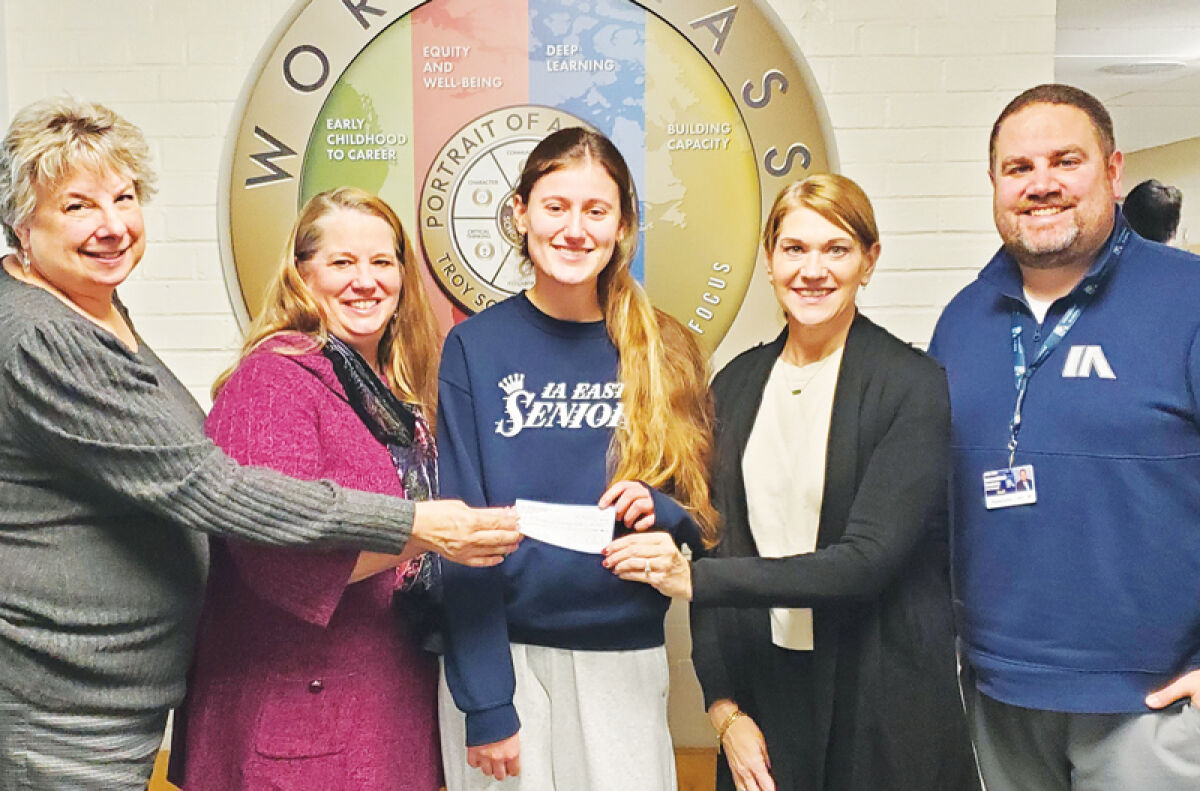  This past December, the Kiwanis Club of Troy presented a check to International Academy East Principal Patrick Griffin and the academy’s counselor, Whitney Bernstein, to further support youth mental health. 
