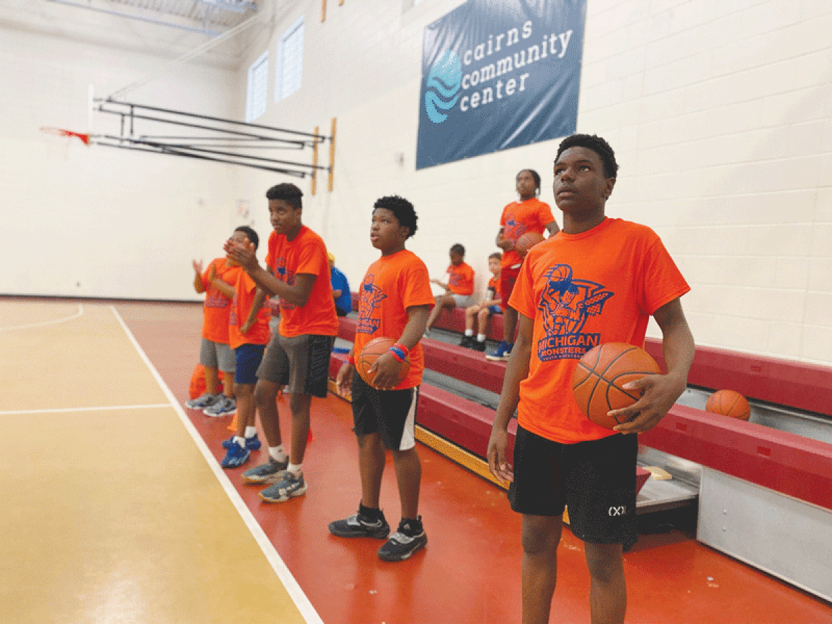  A group of children take part in a basketball camp at the Cairns Community Center in Mount Clemens.  