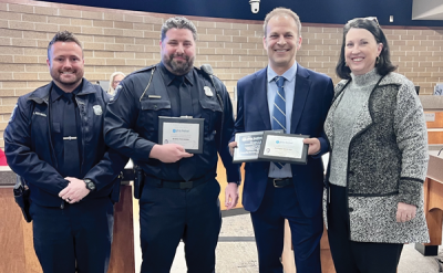  Broadcast Services Specialist Bob Sergott, second from right, earned three different regional Philo T. Farnsworth awards, including one for the Comedy/Humor-Professional category for the On Scene web series “Float Institute” episode shared with police officer hosts Reynolds, far left, and Coates, second from left. Congratulating them is the city’s Community Relations Director Davis, far right.  
