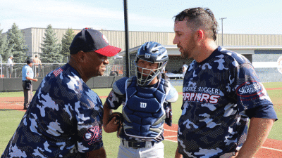  Warriors head coach and former Detroit Tigers outfielder Curtis Pride talks with catcher Shan Donovan, middle, and pitcher Matt Kinsey, right. 