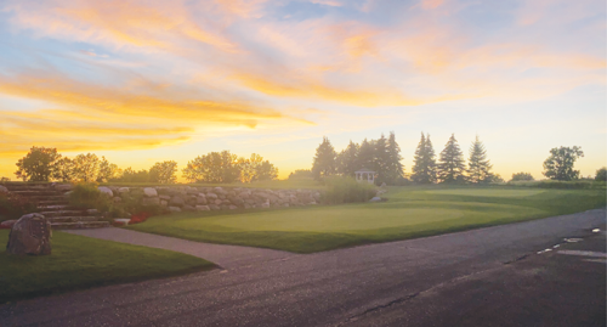 The sun sets on the Boulder Pointe Golf Club in Oxford. 