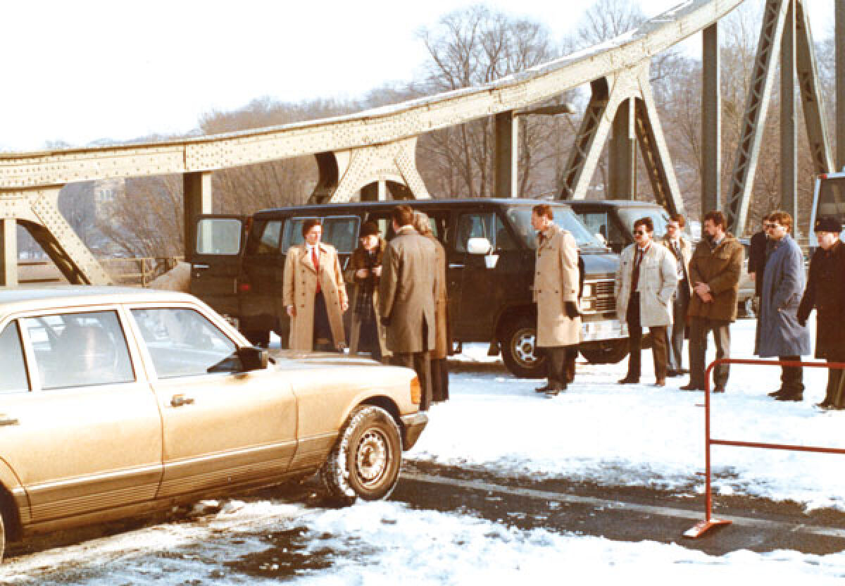  “The Liar” tells the story of Karel Koecher, second from right, seen here being exchanged on the “Bridge of Spies” in Berlin in 1986. 
