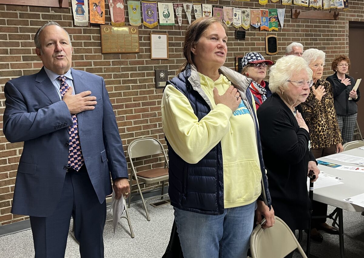  Center Line Mayor Robert Binson, far left, leads the group in the Pledge of Allegiance May 1.  