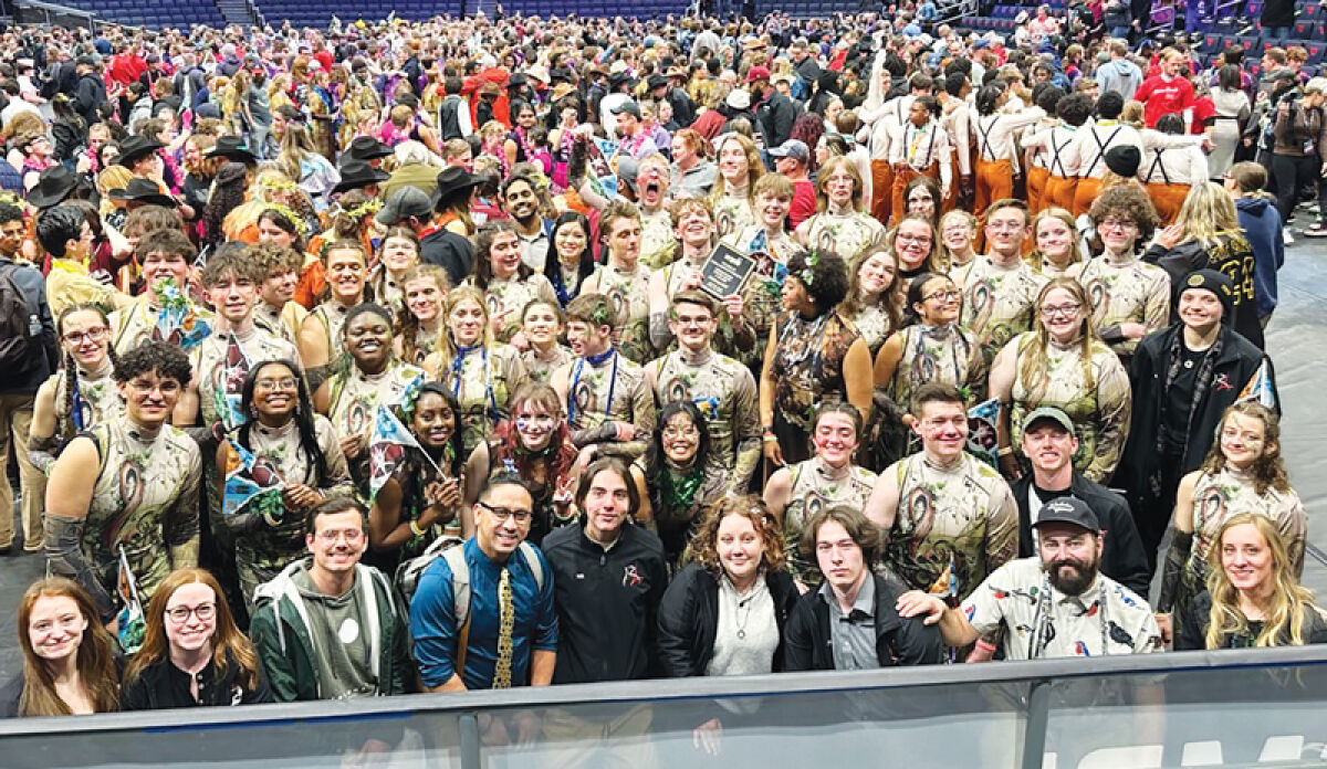  The Dakota High School Drumline poses for a photo after finishing in fifth place at the Winter Guard International world finals at the University of Dayton Arena in Dayton, Ohio, on April 11. It is the highest result the team has achieved. 