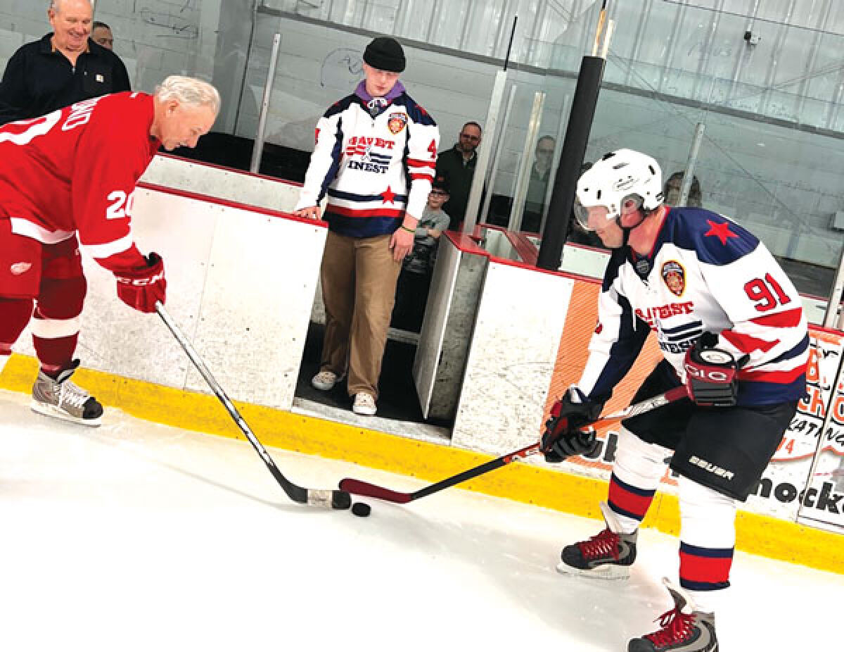  Lane Kleinglass, 18, of Canton, oversees the ceremonial face off between the Detroit Red Wings Alumni and the Royal Oak Police & Fire All-Stars at the John Lindell Ice Arena May 1. 