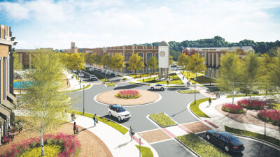  A rendering of a roundabout intersection in “Main Street Macomb.” The development, which has its roots in the township center project first pursued in the 2000s, aims to build a downtown section to the township south of the current municipal complex along the planned expansion of Broughton Road. 